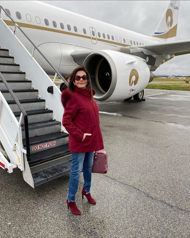 A Picture Of Nita Ambani Posing With Her Jet.