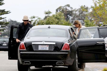 A Picture Of Gisele Bündchen And Tom Brady Alighting From Her Rolls Royce Ghost