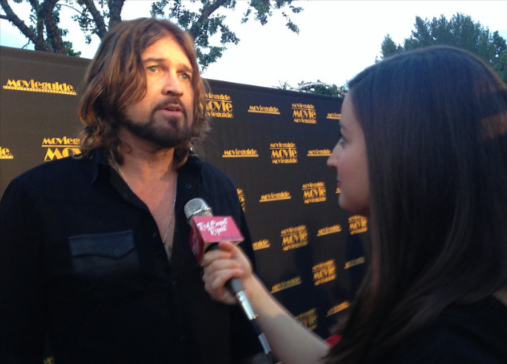 A Picture Of Billy Ray Cyrus Being Interviewed