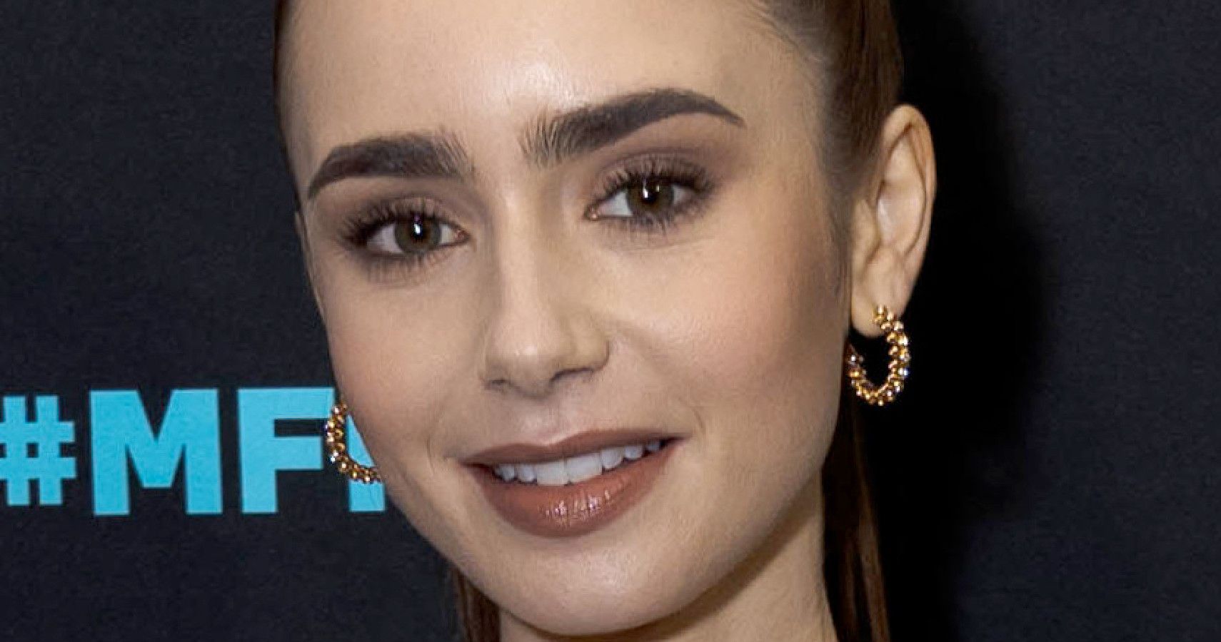 Lily Collins’ $150,000 Engagement Ring & Wedding Band Stolen From Spa ...