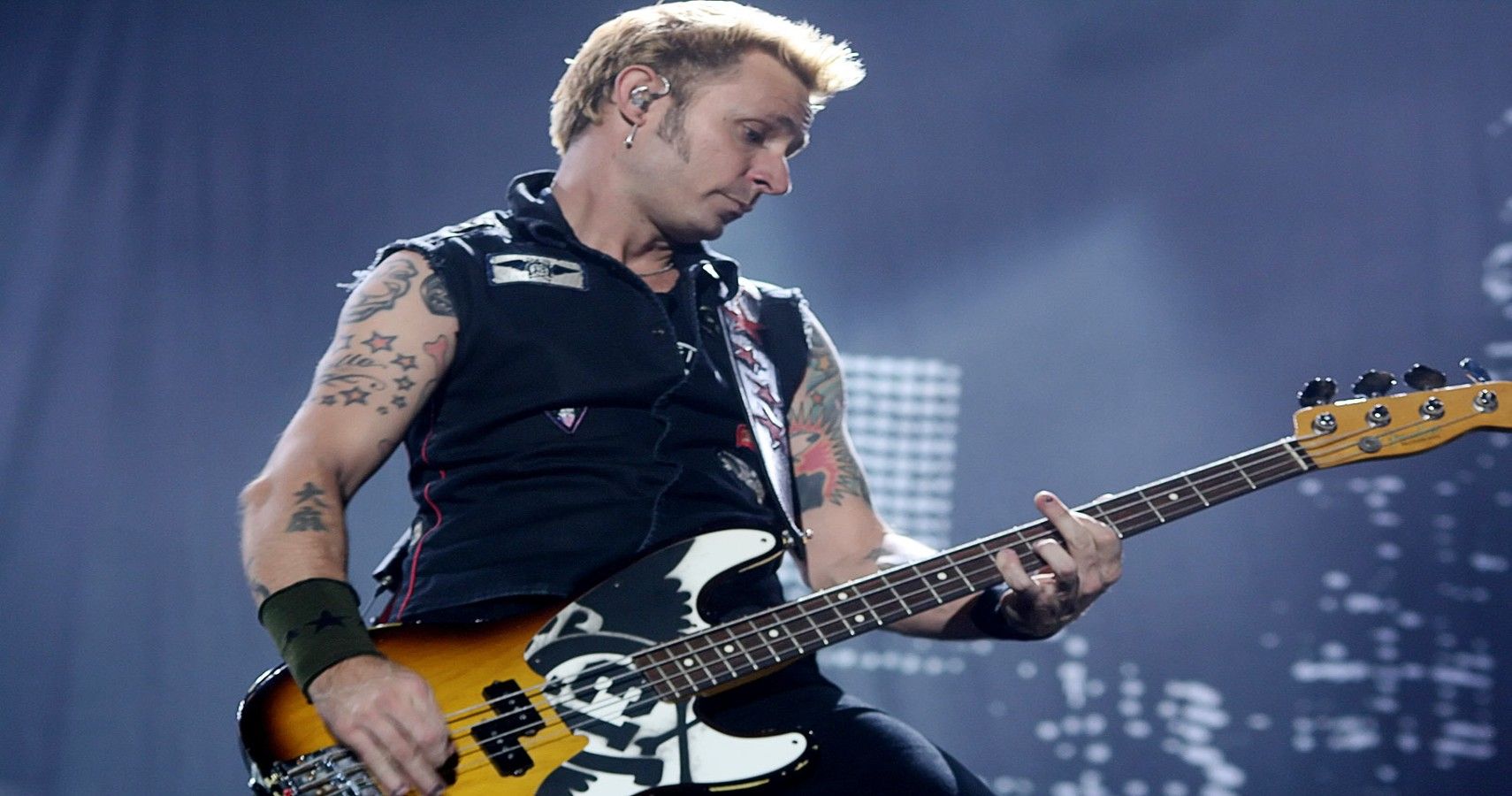 1. Mike Dirnt's Blonde Hair: A Look Back at the Green Day Bassist's Iconic Hairstyles - wide 1
